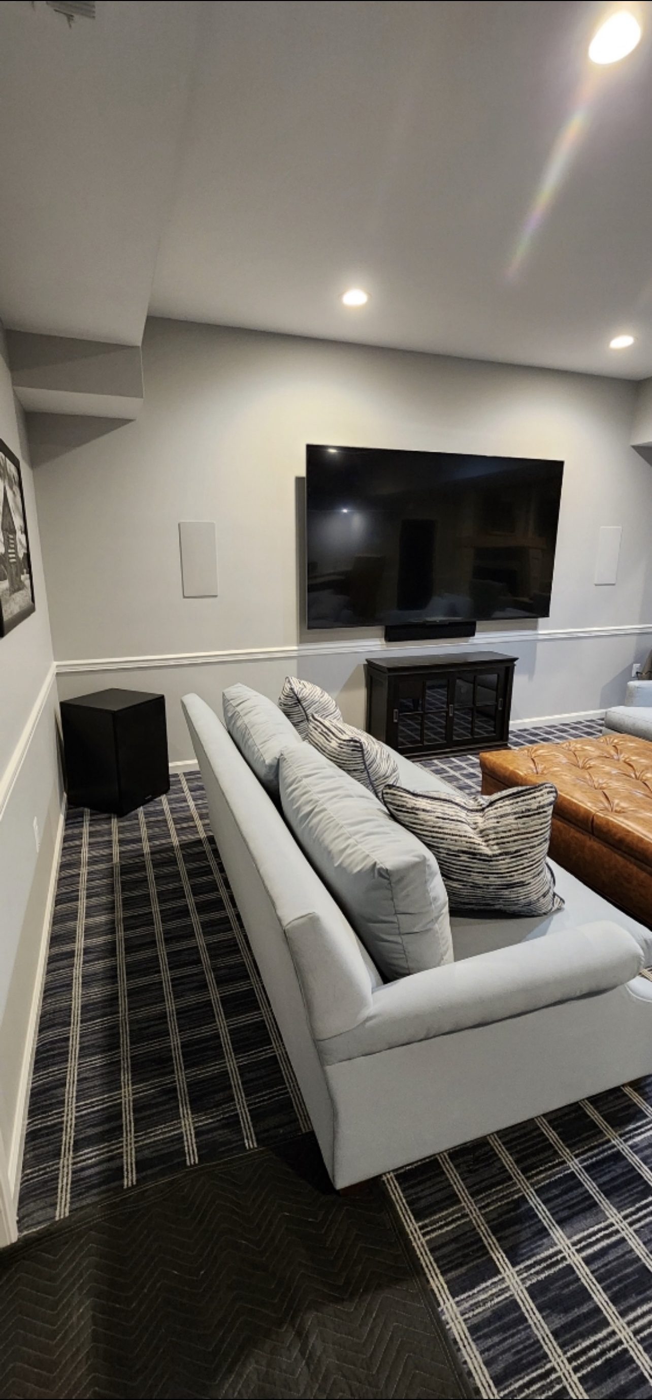 Basement family theater with sectional